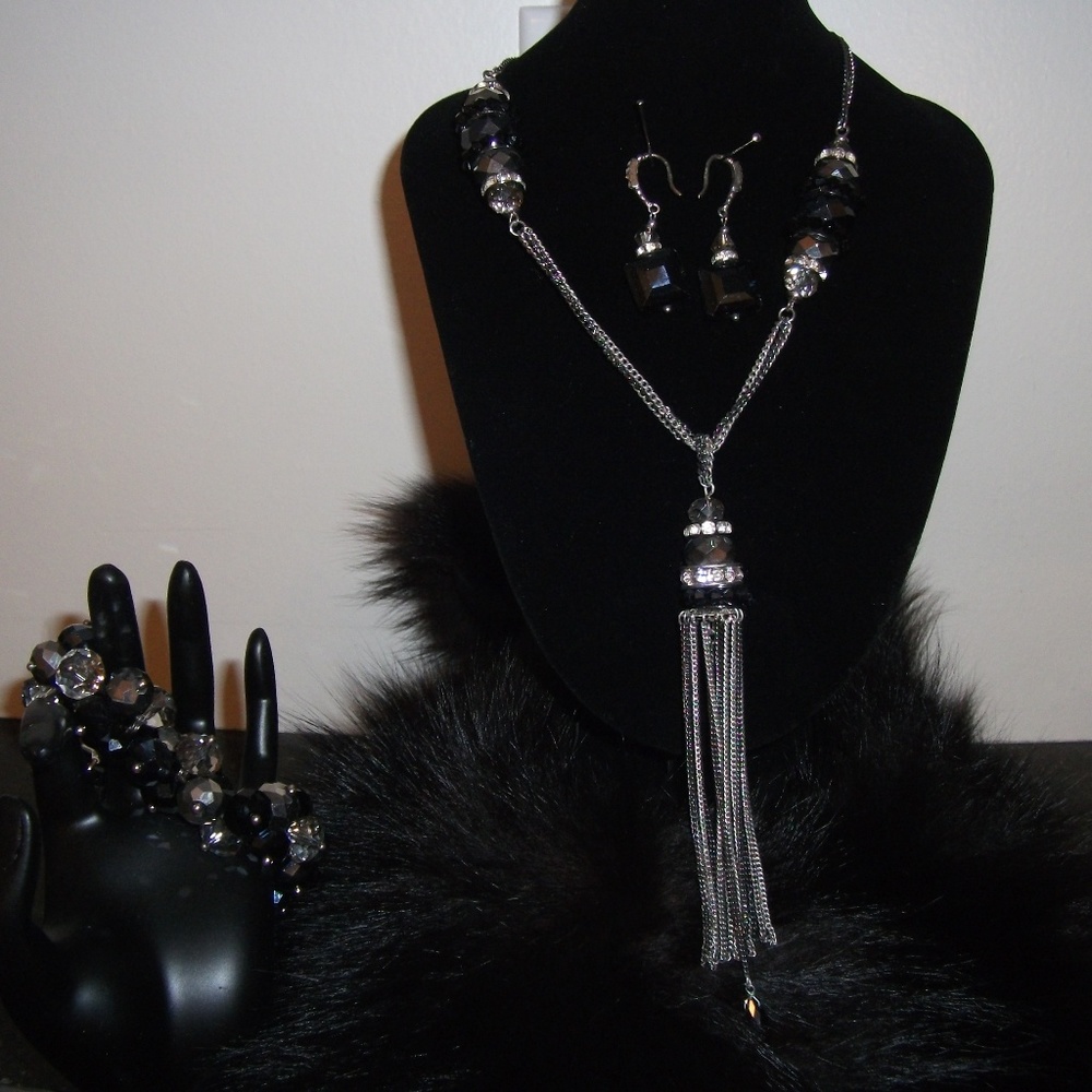 Silver and with dark iridescent blue glass beads